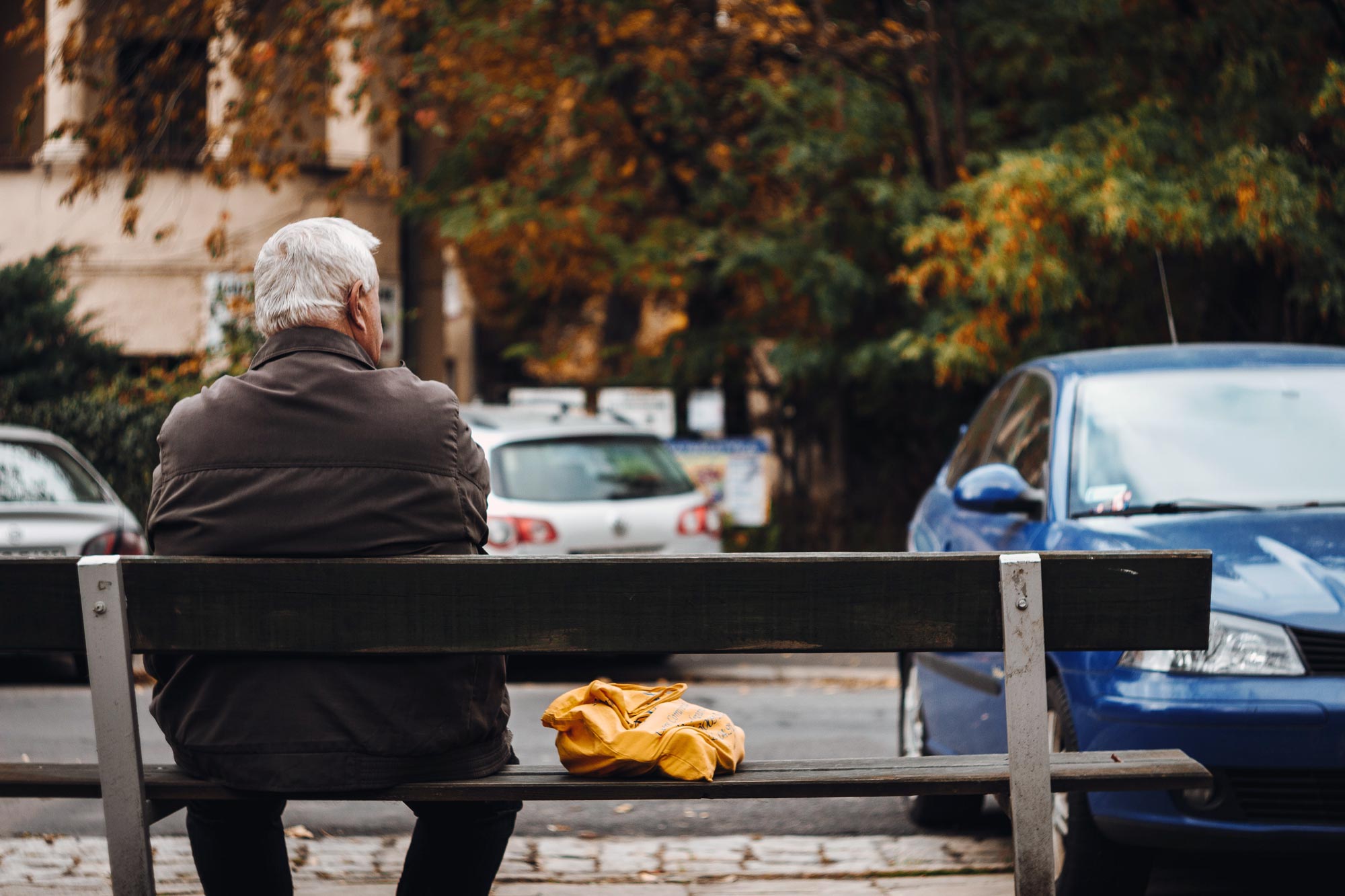 A man sits on a bench